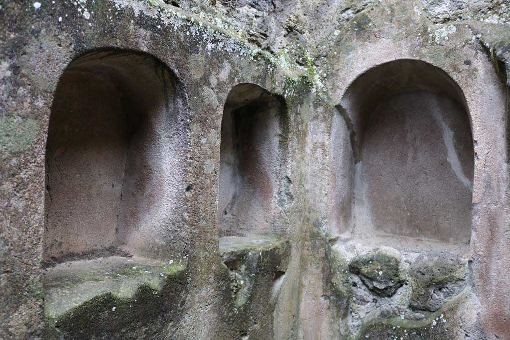 II.8.5 Pompeii. December 2018. 
Three niches in south-west corner of first room on north side of corridor. Photo courtesy of Aude Durand.