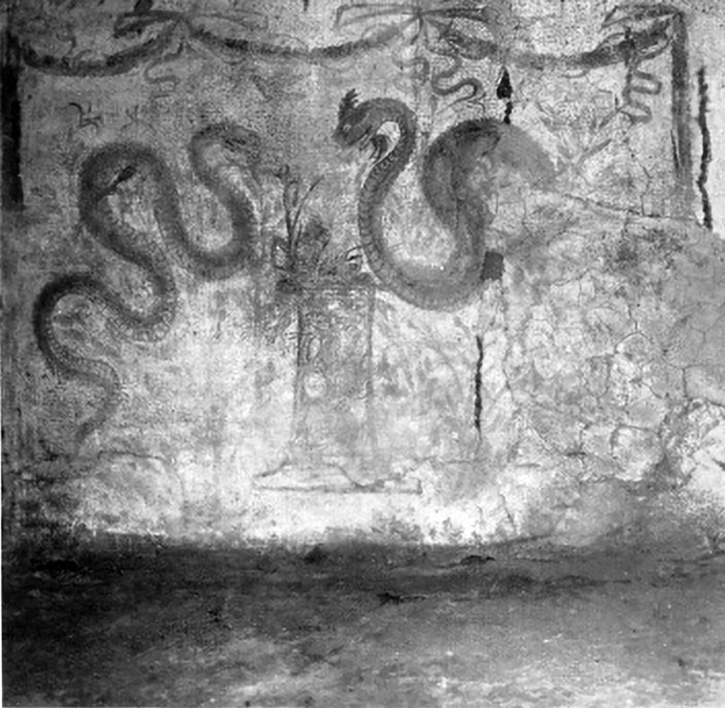 V.2.i Pompeii. 1930s photo by Tatiana Warscher. Room 26, lararium painting on west wall.  
Two serpents approaching a round altar painted in a marble pattern, with a fire and a pine cone on the top.
Above is a triple garland below which is a single bird in flight.
See Boyce G. K., 1937. Corpus of the Lararia of Pompeii. Rome: MAAR 14.  (p.38, no.110 and Pl. 28,2)
See Fröhlich, T., 1991. Lararien und Fassadenbilder in den Vesuvstädten. Mainz: von Zabern. (L49).