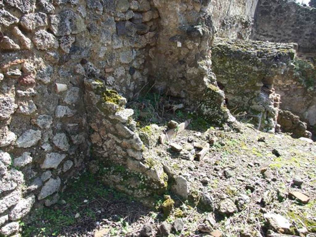 V.4.9 Pompeii. March 2009. Looking south-east towards site of latrine. According to Boyce, in the small room to the left of the entrance, on the south wall near the latrine, was a painting of Fortuna. This is no longer visible. 
See Boyce G. K., 1937. Corpus of the Lararia of Pompeii. Rome: MAAR 14. (p.41, no.122)