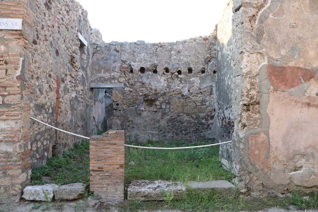 VI.7.5 Pompeii, on right. December 2018. 
Looking north to doorway, with steps to upper floor at VI.7.4, on left. Photo courtesy of Aude Durand.