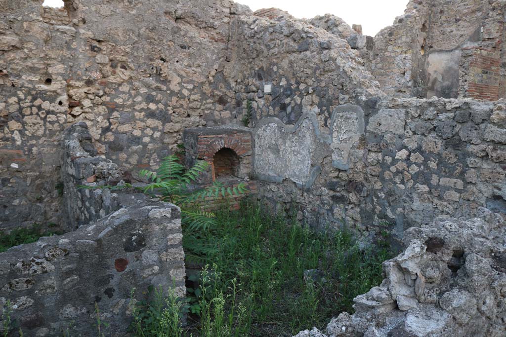 VI.7.7 Pompeii. December 2018. 
Looking north-west towards kitchen area at rear of house, photo taken from VI.7.11. Photo courtesy of Aude Durand.