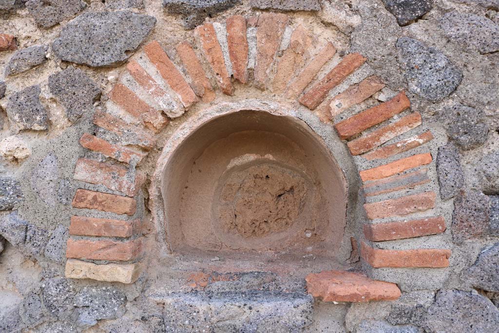 VI.14.16 Pompeii, December 2018. Niche in west wall. Photo courtesy of Aude Durand.
According to Boyce, in the west wall of the main room is an arched niche (h.0.31, w.0.41, d.0.26, h. above floor 1.45).
See Boyce G. K., 1937. Corpus of the Lararia of Pompeii. Rome: MAAR 14.(p.52, no.198).