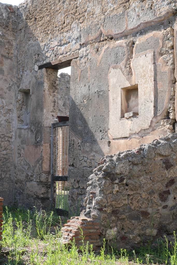 VI.14.18 Pompeii. December 2018. 
Doorway in north wall of the main room with niche, leading into atrium of VI.14.20, taken from VI.14.19. 
Photo courtesy of Aude Durand.