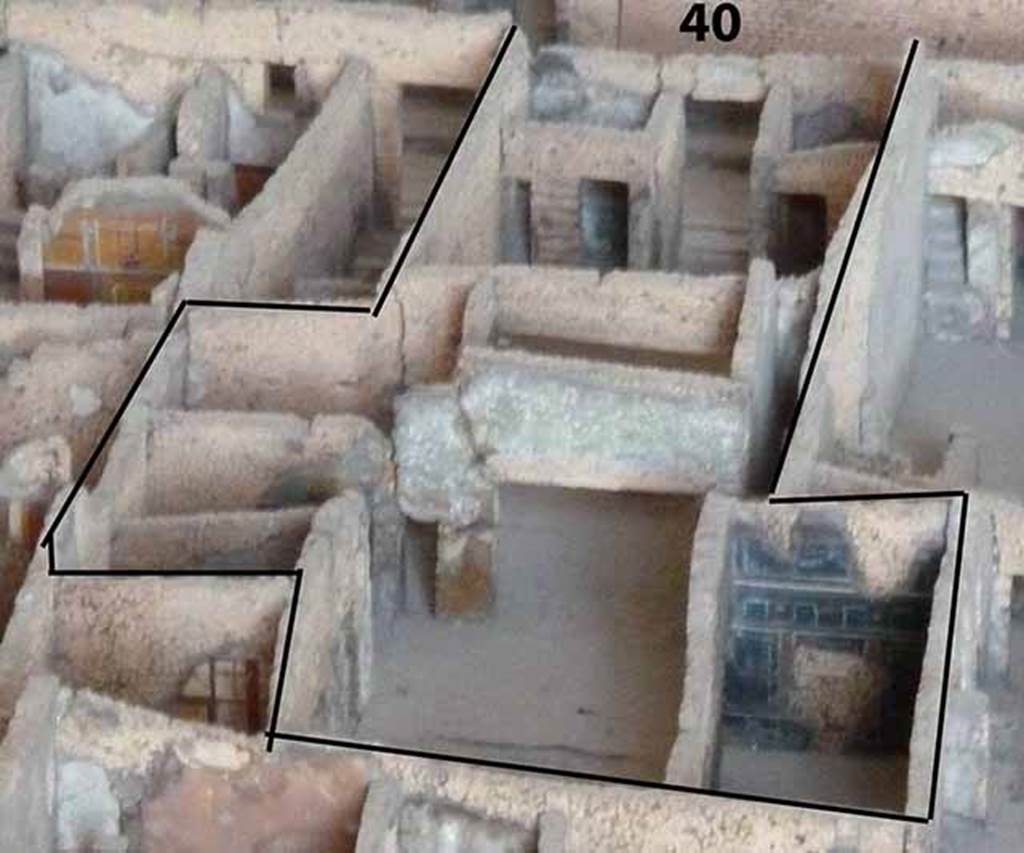VI.14.40 Pompeii. Looking west from rear, across area on cork model in Naples Archaeological Museum.
Note the large triclinium, on the right, (north side) with the painted decoration.
According to Boyce, on the south side of the peristyle beside the doorway to the kitchen, was found a fragmentary lararium painting, of which only the left side was preserved. A yellow serpent with red crest coiled above a flaming altar.
The entire painting was originally framed by an aedicula painted in red, within which were green garlands with red flowers stretched across the top and hanging down the sides.
See Boyce G. K., 1937. Corpus of the Lararia of Pompeii. Rome: MAAR 14. (p. 54, no. 208)
See Sogliano, A., 1879. Le pitture murali campane scoverte negli anni 1867-79. Napoli: (p. 18, no. 57, he described it as damaged on the right extremity). 
See Giacobello, F., 2008. Larari Pompeiani: Iconografia e culto dei Lari in ambito domestico.  Milano: LED Edizioni. (p. 180).