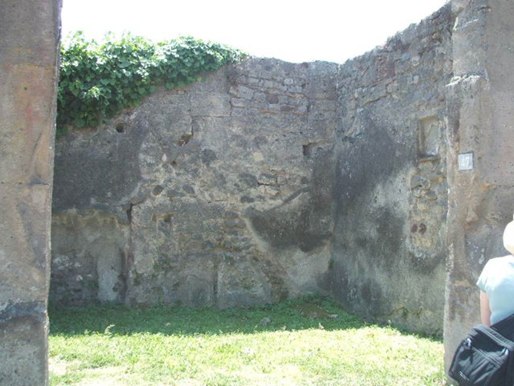 VII.4.47 Pompeii. May 2005. Looking south towards south-west corner of shop. In the west wall can be seen a small rectangular niche.
See Boyce G. K., 1937. Corpus of the Lararia of Pompeii. Rome: MAAR 14. (p.65, no.274)
