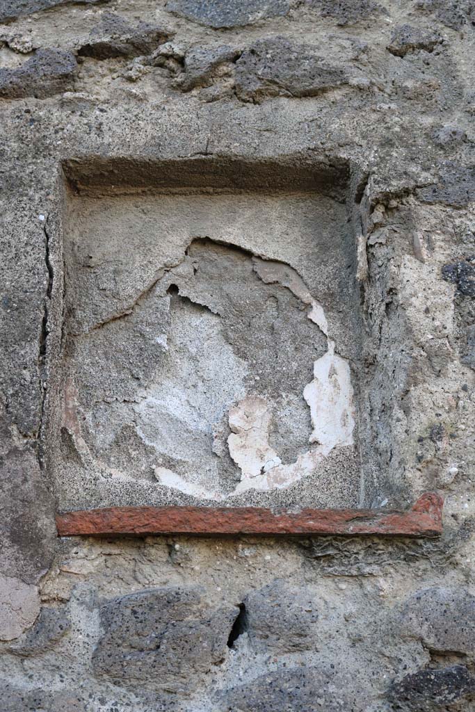 VII.4.47 Pompeii. December 2018. 
Rectangular niche set into west wall of shop-room. Photo courtesy of Aude Durand.