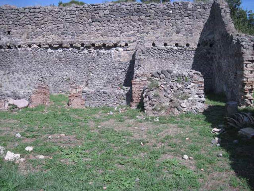 I.1.3 Pompeii. September 2010. Large yard, with stables near the east wall. Looking east. Photo courtesy of Drew Baker.
