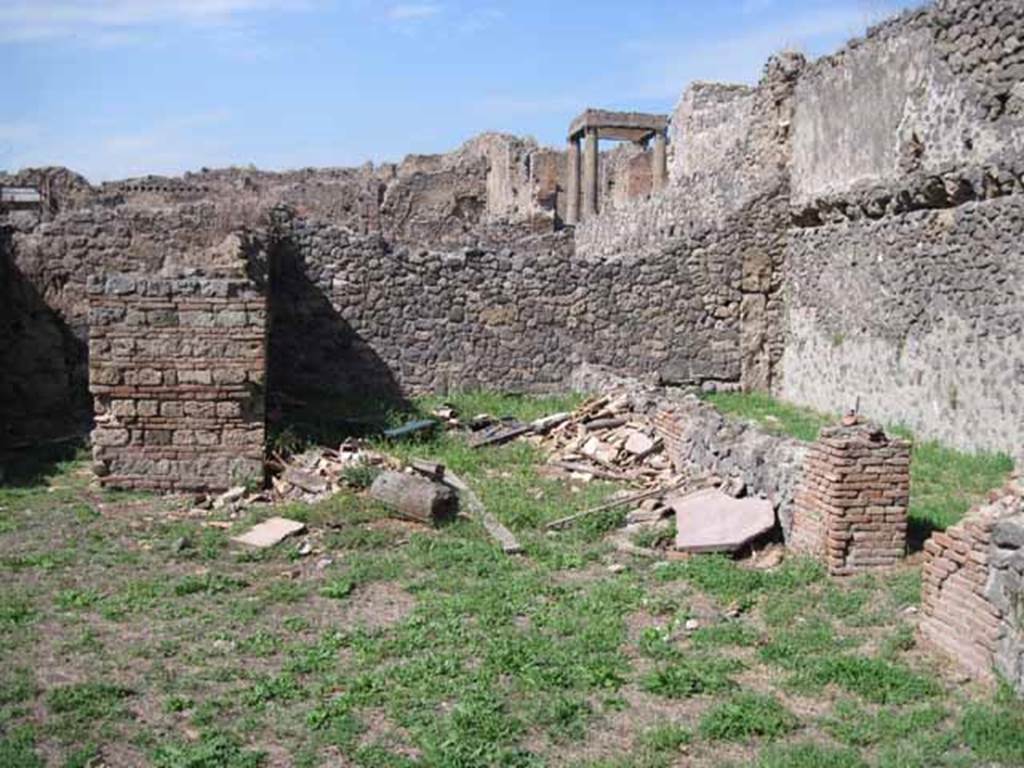 I.1.3 Pompeii. September 2010. Looking north into north-east corner of yard and stables. Photo courtesy of Drew Baker.