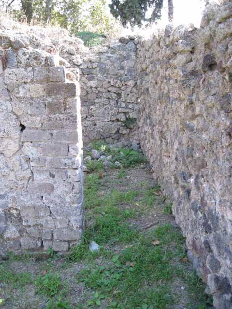 I.1.3 Pompeii. September 2010. 
Doorway in south-west corner to room “i” near south wall. Photo courtesy of Drew Baker.