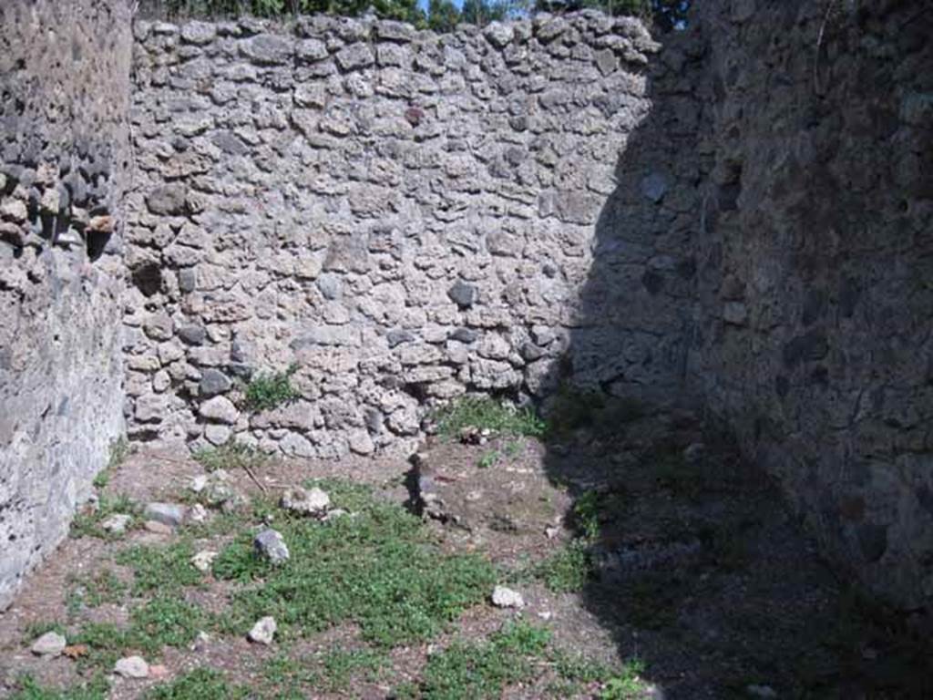 I.1.3 Pompeii. September 2010. East wall of room “i”, with base of steps to upper floor in south-east corner?  Photo courtesy of Drew Baker.