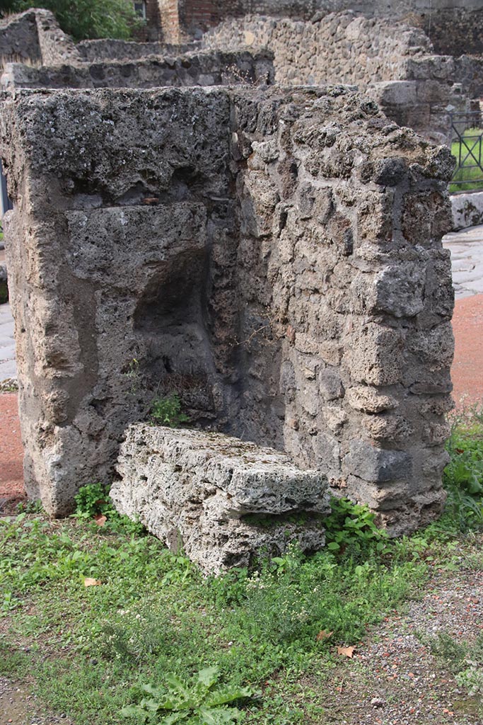 I.1.4 Pompeii. October 2024. 
Detail from north-west corner of shop-room. Photo courtesy of Klaus Heese.