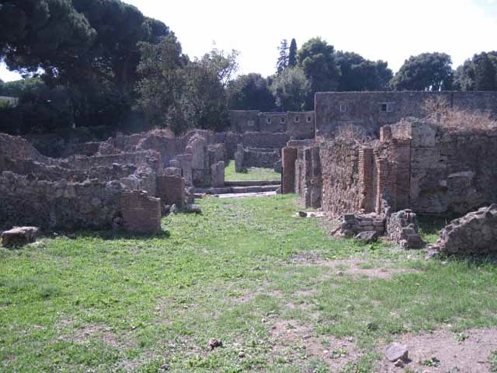 I.1.8 Pompeii. September 2010. Large rear yard. Looking west across entrance room towards Via Stabiana. Photo courtesy of Drew Baker.