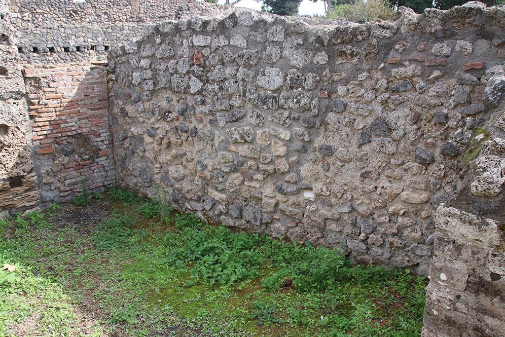 I.1.9 Pompeii. October 2024. South wall of rear room. Photo courtesy of Klaus Heese.
