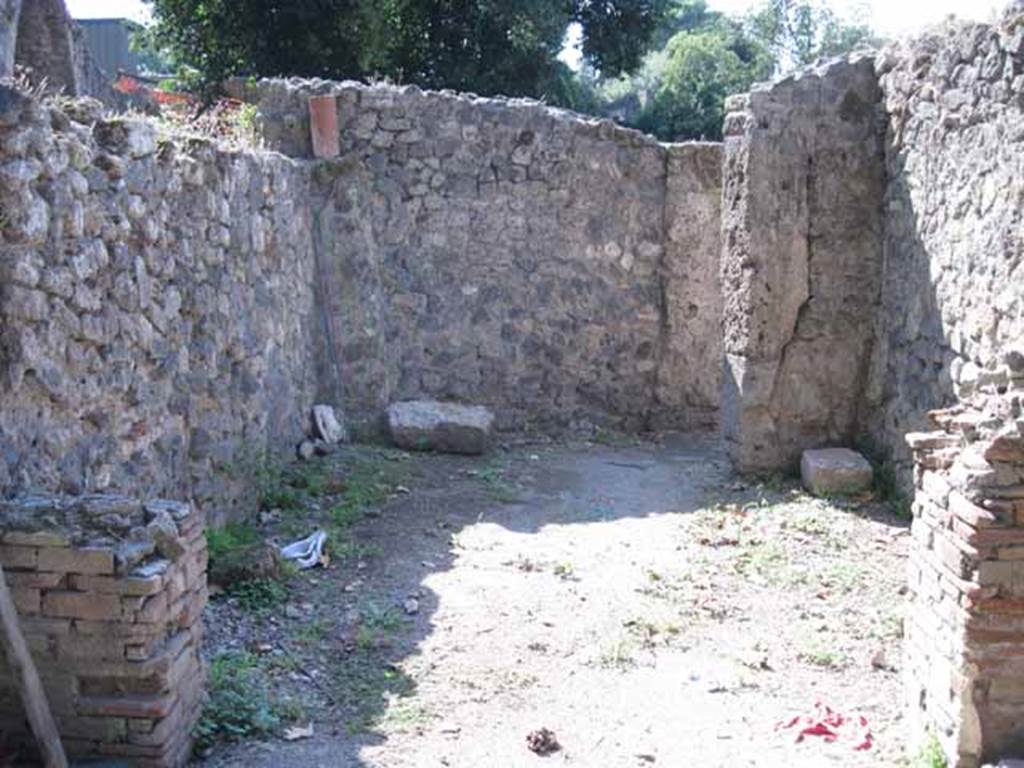 I.1.10 Pompeii. September 2010. Looking west towards room with doorway leading to I.1.1, from entrance room. Photo courtesy of Drew Baker.
