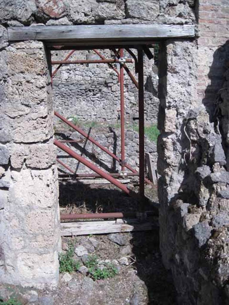 1.2.1 Pompeii. September 2010. Doorway in east wall of rear room into a second rear room. Photo courtesy of Drew Baker.