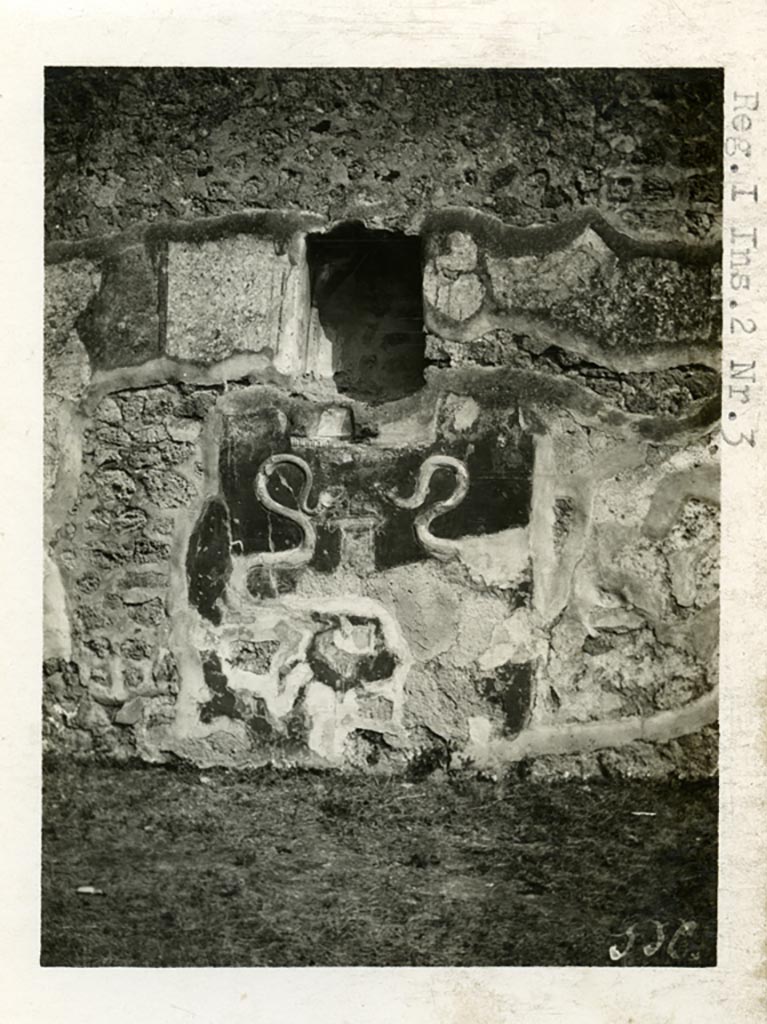 I.2.3 Pompeii. Pre-1937-39. 
Photo in AAR archive dated pre-1937-39. Looking towards south wall of atrium, with lararium.
It seems to be the same as the one dated by Warscher as 1912 in the DAIR copy of the codex.
Photo courtesy of American Academy in Rome, Photographic Archive. Warsher collection no. 556.