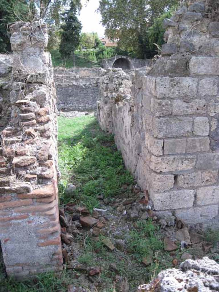1.2.3 Pompeii. September 2010. Looking south along corridor leading to kitchen. Photo courtesy of Drew Baker.