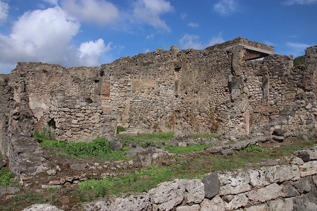 I.2.3 Pompeii. October 2024. Two rooms in the south-east corner at the rear of the house, on right. 
Taken from side road, Vicolo del Conciapelle. Photo courtesy of Klaus Heese.