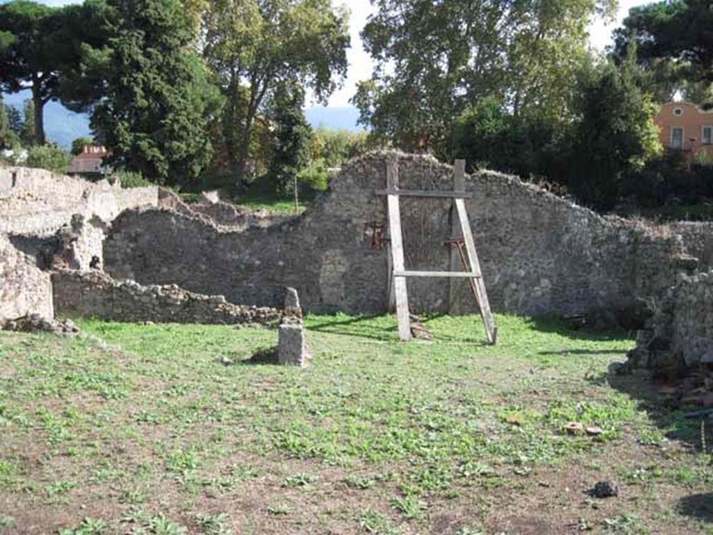 1.2.6 Pompeii. September 2010. Looking south across atrium, towards remains of south perimeter wall, and house I.2.3.  Photo courtesy of Drew Baker