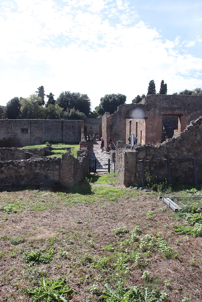 1.2.6 Pompeii. October 2024.
Looking west across atrium, towards entrance corridor and doorway to Via Stabiana. 
Photo courtesy of Klaus Heese.