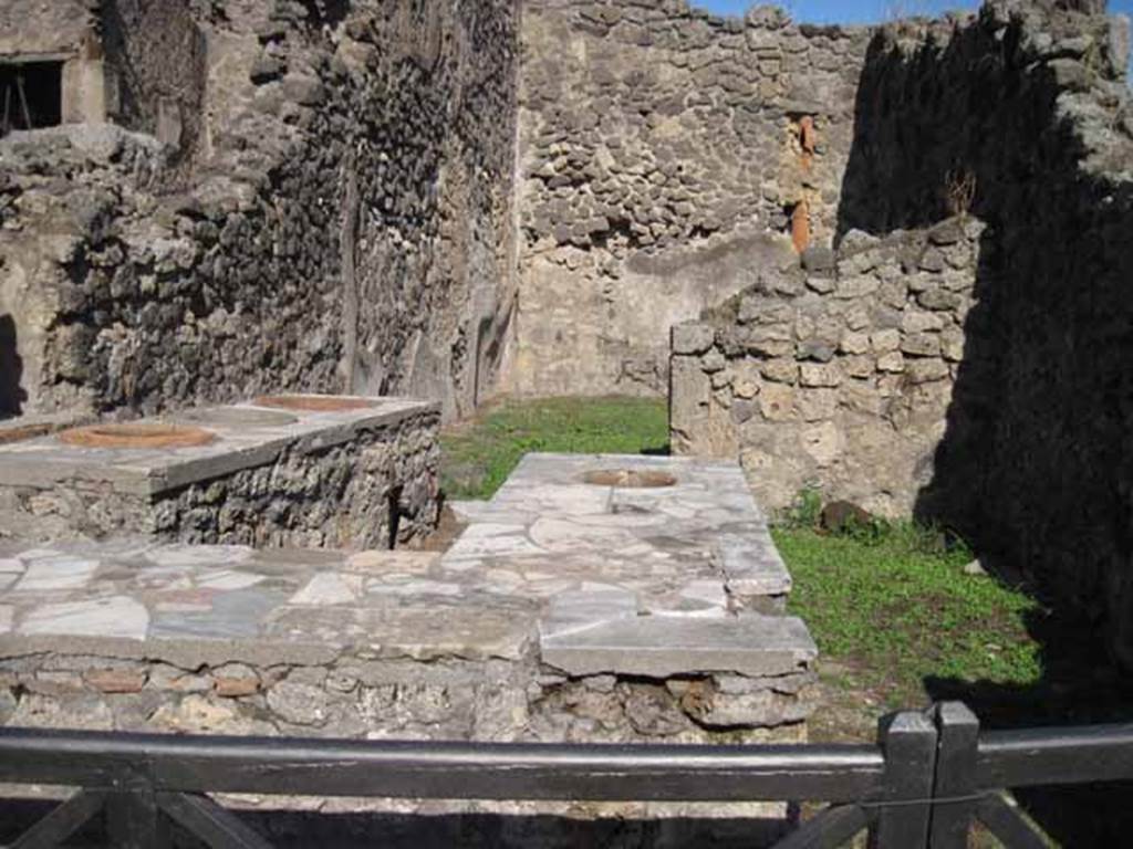 1.2.8 Pompeii. September 2010. Looking east across bar towards rear room. Photo courtesy of Drew Baker.