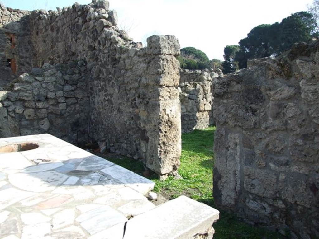 I.2.8 Pompeii.  December 2007.  South wall with doorway linking to I.2.7..
.