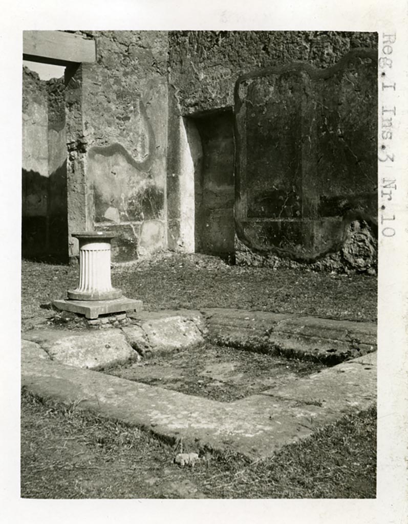 I.2.10 Pompeii but shown as I.3.10 on photo. 1937-39. 
Looking towards the south-east corner of the atrium with recess/cupboard and painted decoration on wall.
Photo courtesy of American Academy in Rome, Photographic Archive. Warsher collection no. 1809.