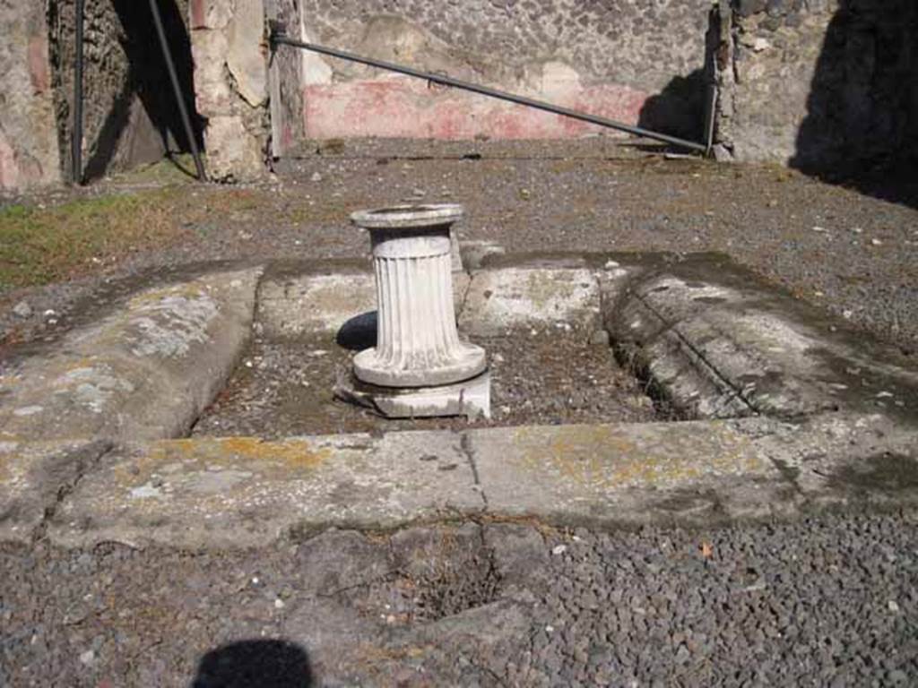 I.2.10 Pompeii. September 2010. Looking east across impluvium in atrium, towards tablinum. Photo courtesy of Drew Baker.