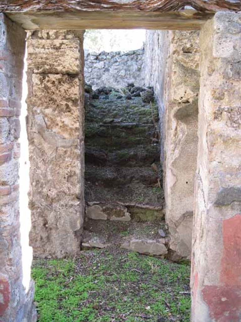 I.2.10 Pompeii. September 2010. Looking south across corridor towards steps to upper floor. Photo courtesy of Drew Baker