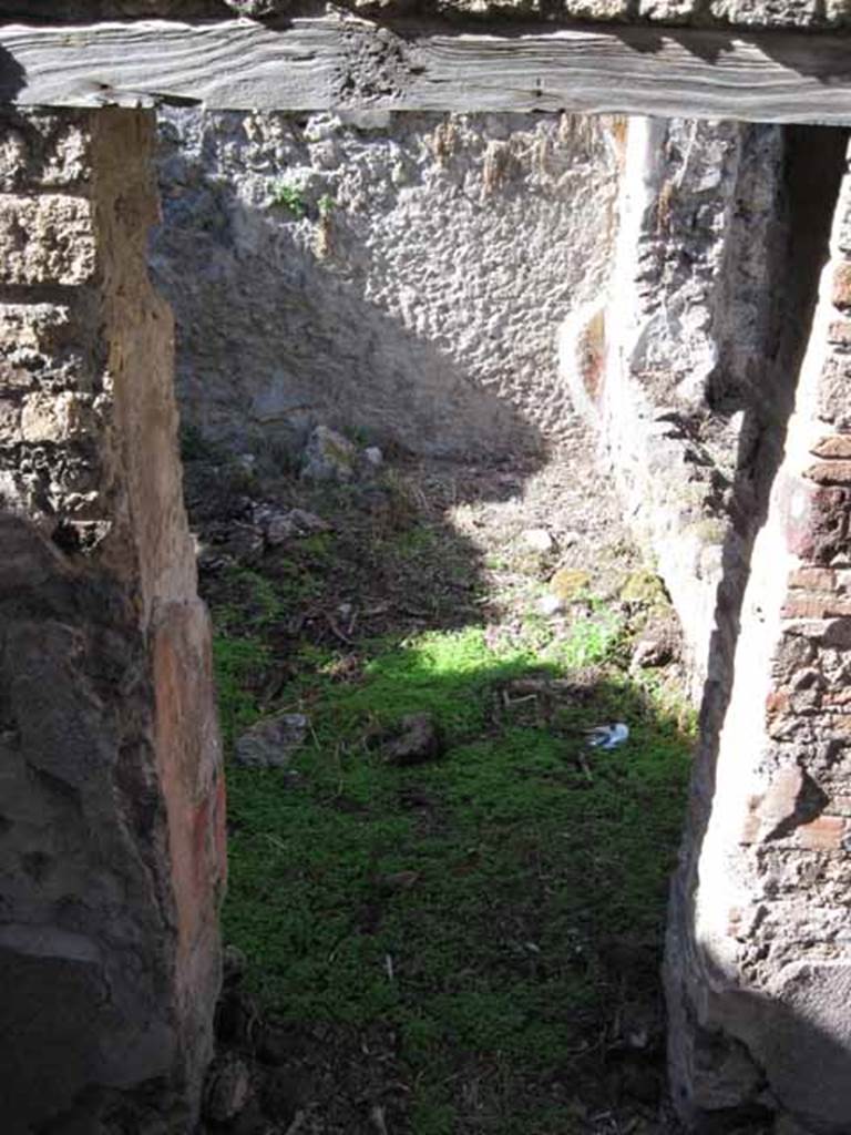 I.2.10 Pompeii. September 2010. Doorway in north side of corridor into triclinium. Photo courtesy of Drew Baker.