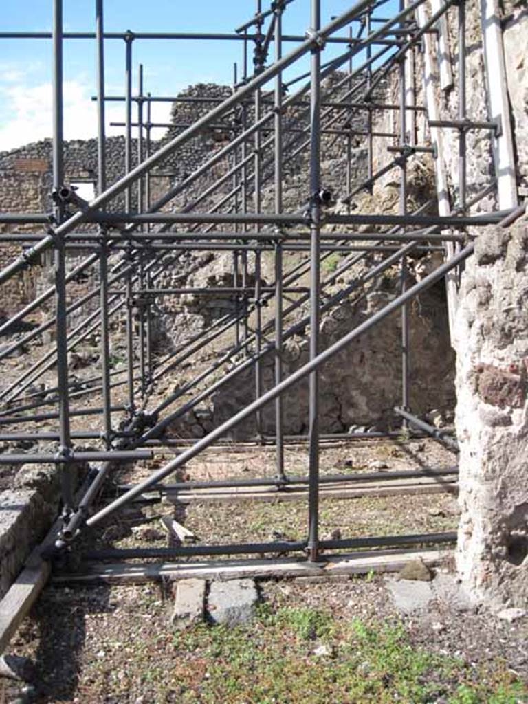 I.2.10 Pompeii. September 2010. 
Looking north into remains of second room on north side of atrium. Photo courtesy of Drew Baker.
According to Eschebach, this would have been the ala (or a storeroom or cupboard).
See Eschebach, L., 1993. Gebäudeverzeichnis und Stadtplan der antiken Stadt Pompeji. Köln: Böhlau. (p.16)