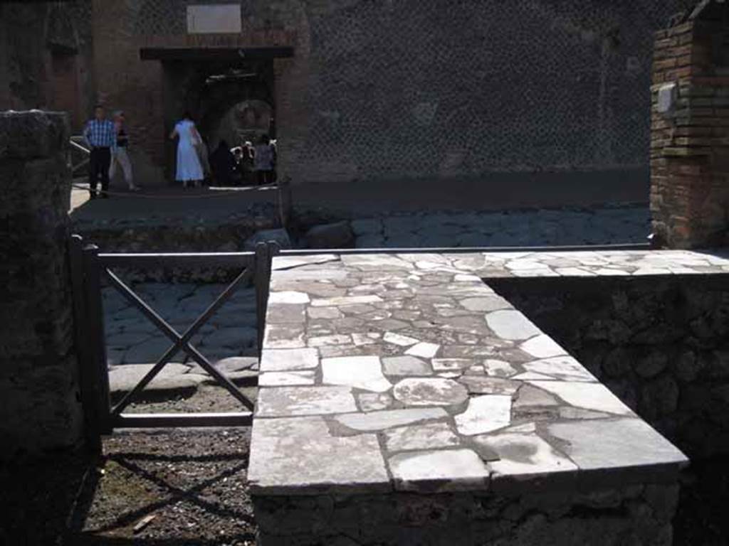 I.2.11 Pompeii. September 2010. Looking west from bar, towards entrance and Via Stabiana. Photo courtesy of Drew Baker.