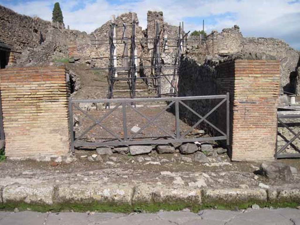 I.2.12 Pompeii. September 2010. Looking east to entrance doorway from Via Stabiana. Photo courtesy of Drew Baker.