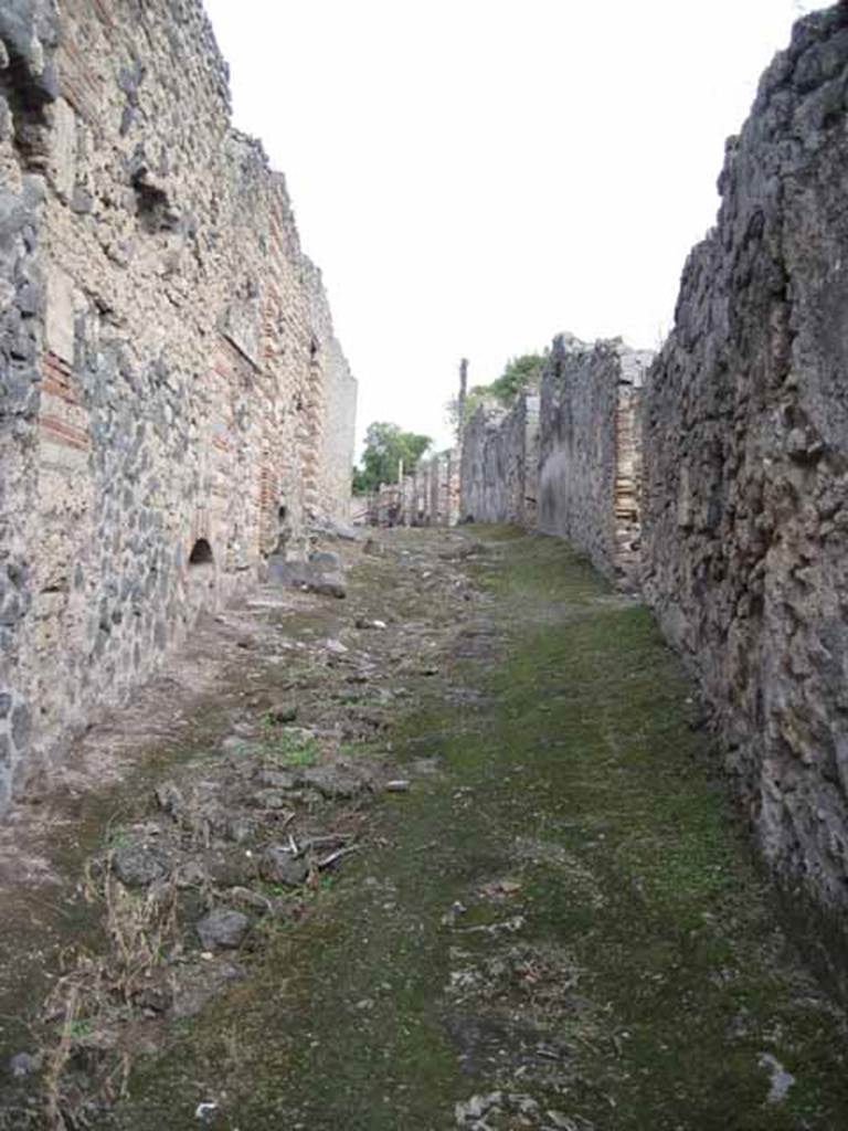 I.2.15 Pompeii. September 2010. Looking east along unnamed vicolo, from entrance doorway. Photo courtesy of Drew Baker.