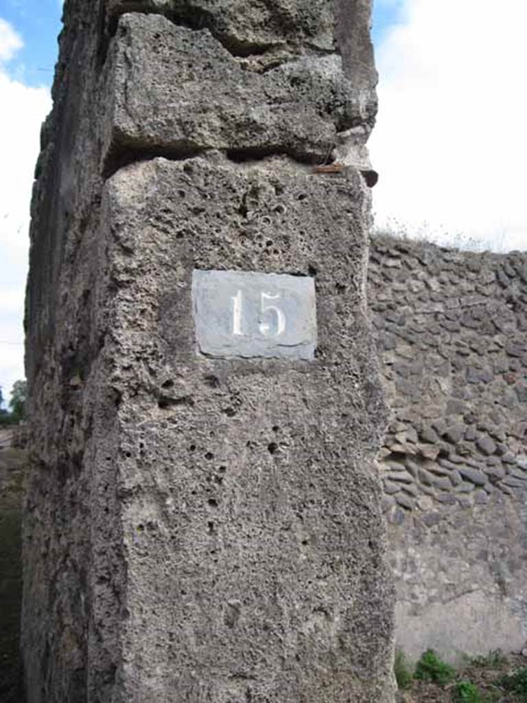 I.2.15 Pompeii. September 2010. ID number plate on east side of entrance doorway. Photo courtesy of Drew Baker.