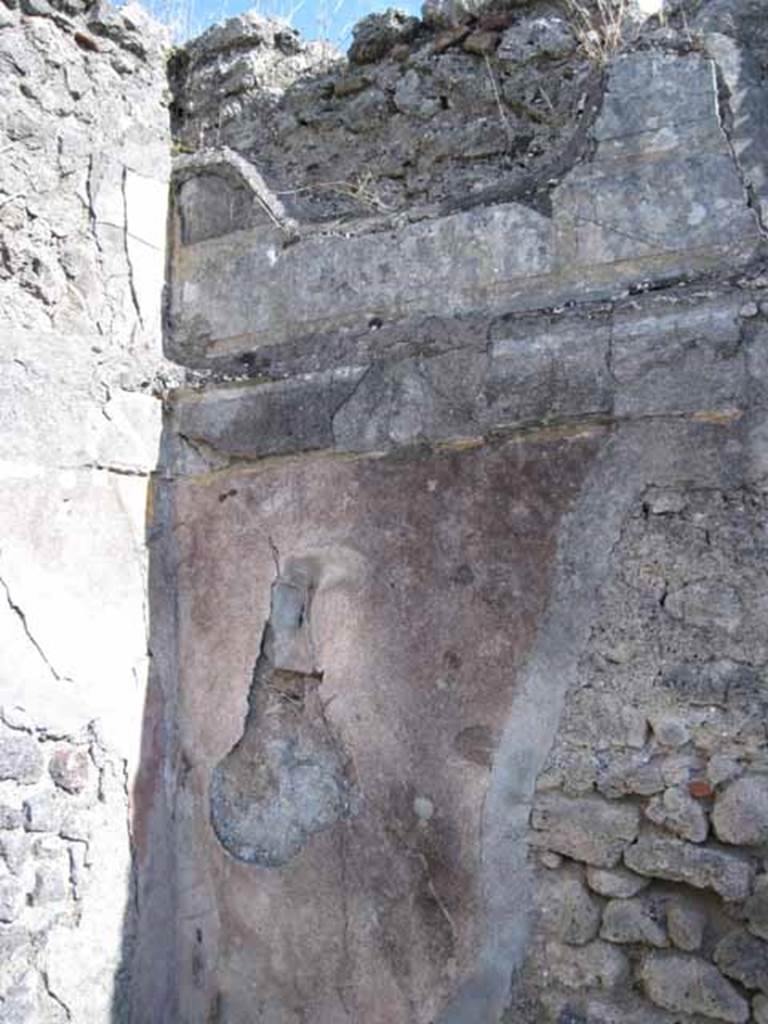 1.2.16 Pompeii. September 2010. Room 4, oecus, remaining first style decoration in south-east corner. Photo courtesy of Drew Baker.