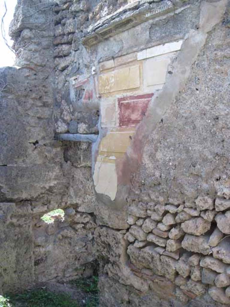 1.2.16 Pompeii. September 2010. Room 5, north wall of cubiculum, with first style decoration in north-west corner, near doorway to room 4. Photo courtesy of Drew Baker.