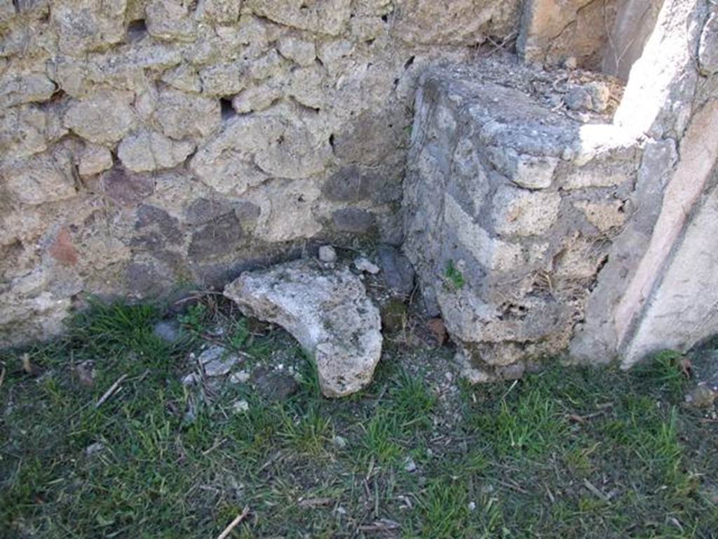 I.2.16 Pompeii. March 2009. Room 6, garden area. Masonry podium of lararium. According to Boyce, the arched niche was built on top of the solid podium, which were all in a ruinous condition.
See Boyce G. K., 1937. Corpus of the Lararia of Pompeii. Rome: MAAR 14. (p.22)