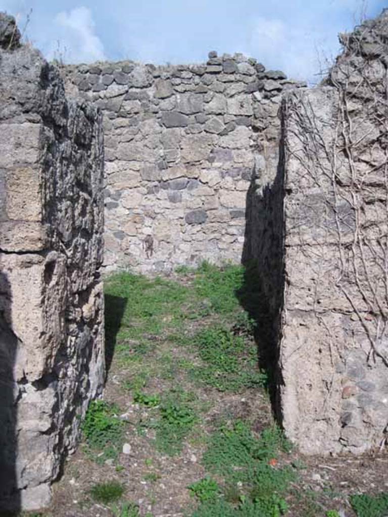 1.2.16 Pompeii. September 2010. Doorway to room 2, in north-east corner of portico, looking east. Photo courtesy of Drew Baker.