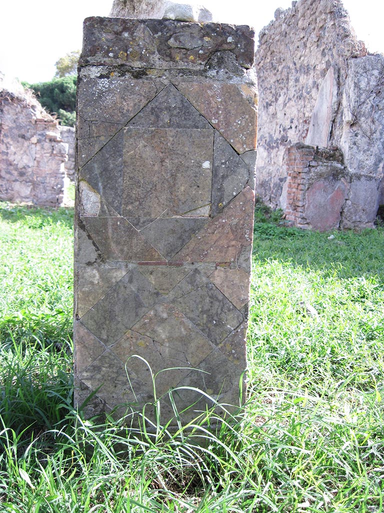 I.2.17 Pompeii. September 2010. 
Detail of marble work on base in atrium, looking south. Photo courtesy of Drew Baker.