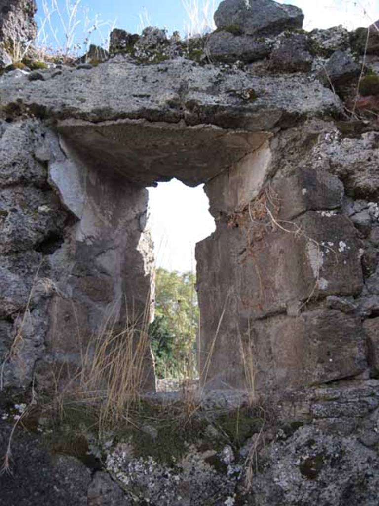 I.2.17 Pompeii. September 2010. Room 6, upper south wall with detail of window. Photo courtesy of Drew Baker.