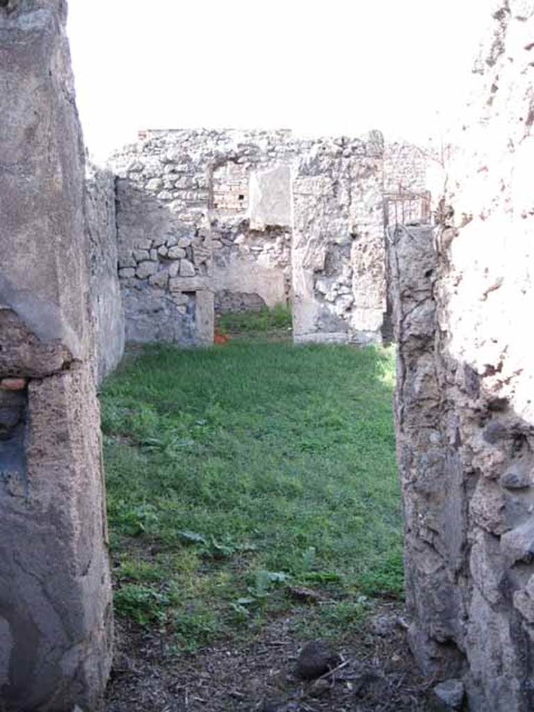 I.2.17 Pompeii. September 2010. Room 6, north wall with doorway to atrium. Photo courtesy of Drew Baker.
