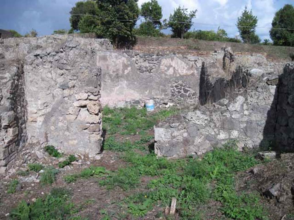 I.2.17 Pompeii. September 2010. Looking east from garden room 8, through doorway in east wall to room 10. Photo courtesy of Drew Baker.