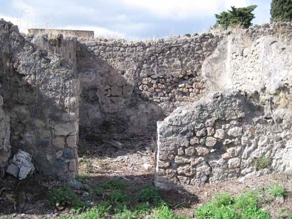 I.2.17 Pompeii. September 2010. Looking north in room 12, towards doorway in north wall to room 4. Photo courtesy of Drew Baker.