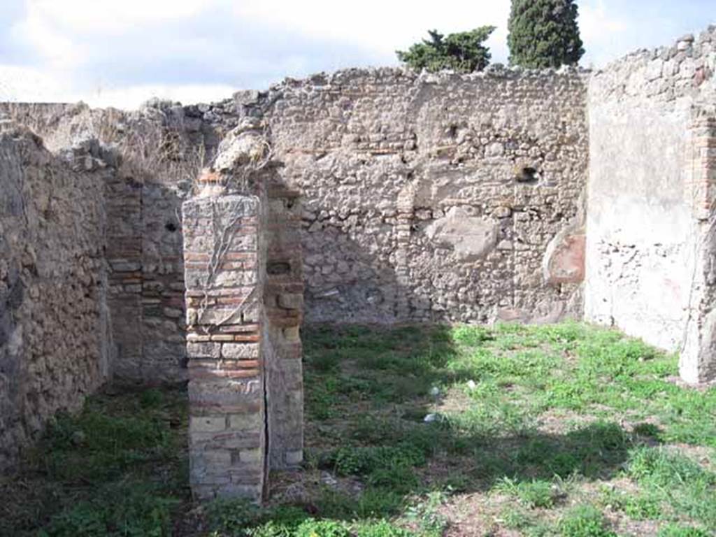 I.2.17 Pompeii. September 2010. North-west corner of portico in garden, looking north into room 14. Photo courtesy of Drew Baker.
