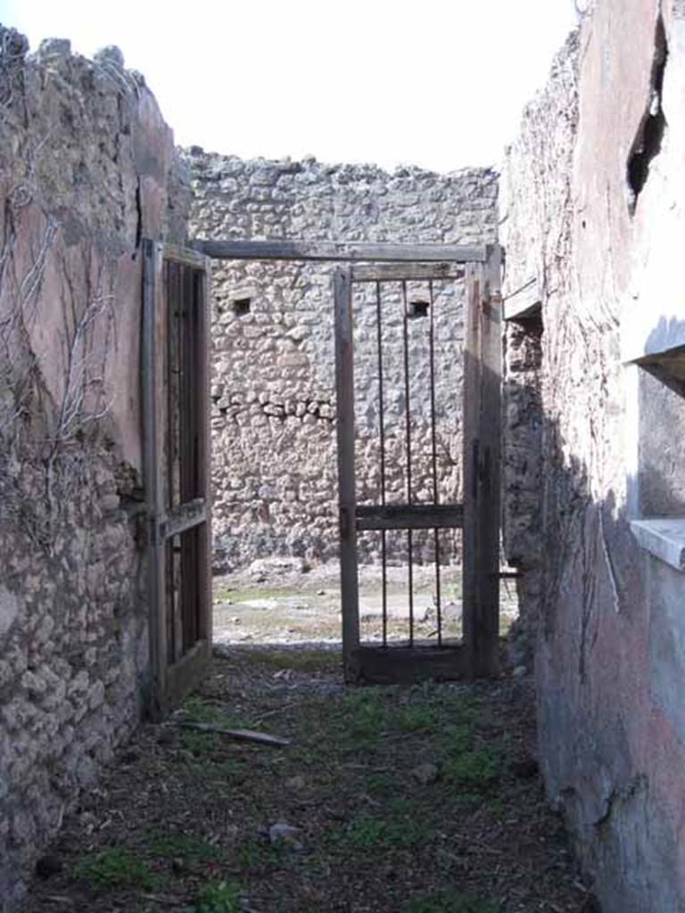 I.2.17 Pompeii. September 2010. Entrance corridor, looking north onto unnamed vicolo. Photo courtesy of Drew Baker.