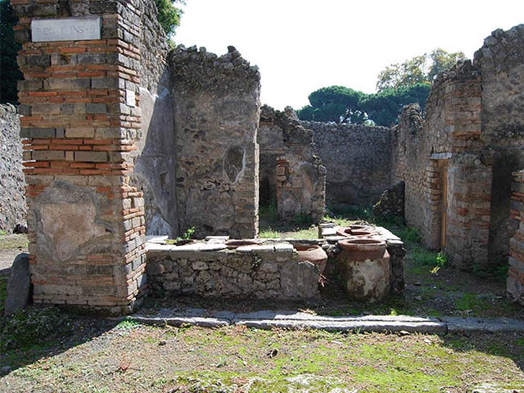 I.2.18 Pompeii. October 2013. Looking south across unnamed vicolo towards entrance doorway. Photo courtesy of Paula Lock.