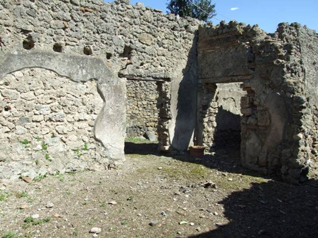 I.2.19 Pompeii. March 2009. Rear entrance doorway, and room on south side of doorway.  Taken from doorway from I.2.17. Looking south-east.
