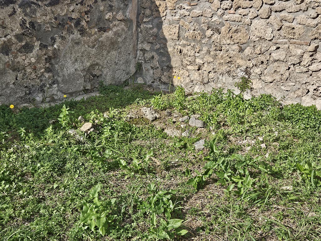 I.2.20 Pompeii. November 2024. 
North-west corner of garden area with remains of two-sided biclinium. Photo courtesy of Annette Haug.
