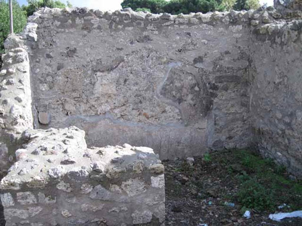 I.2.21 Pompeii. September 2010. Looking south along Vicolo del Citarista.
The entrance doorway is on the right (west) of the photo. Photo courtesy of Drew Baker.